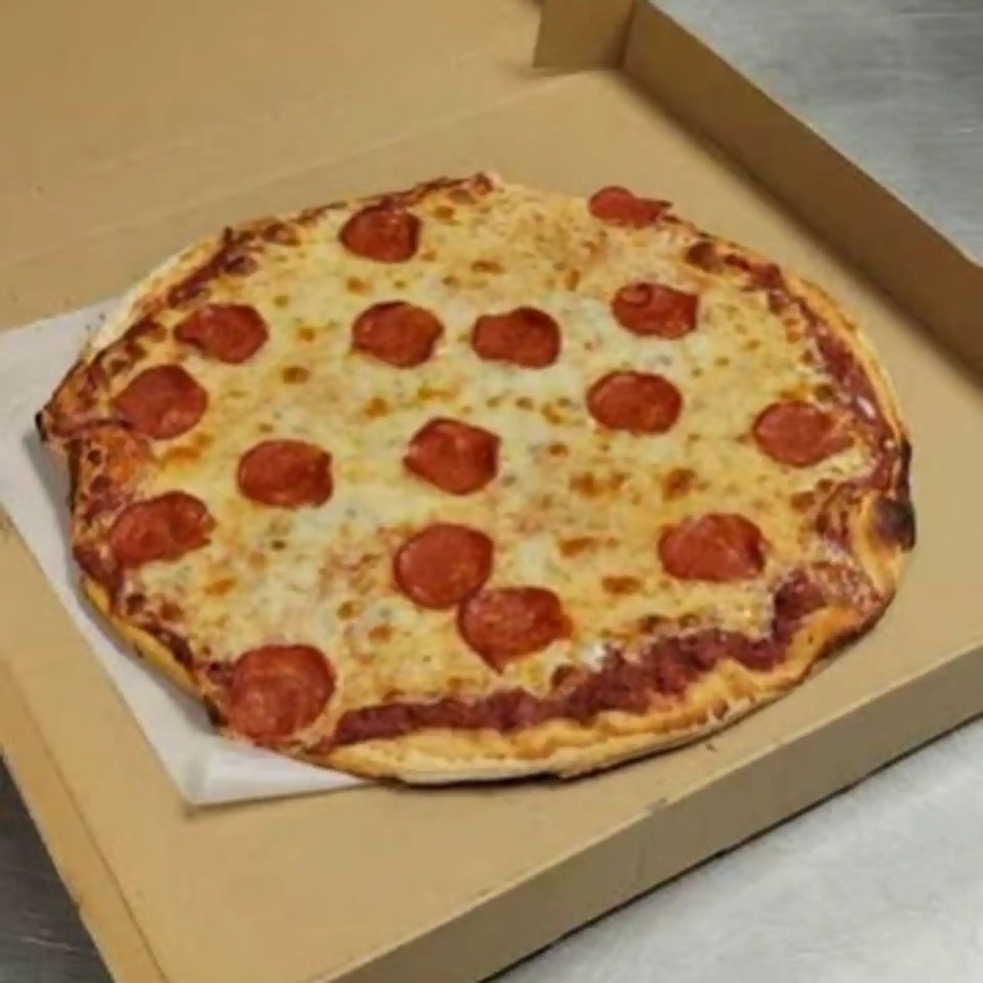 Fresh pizza with melted cheese